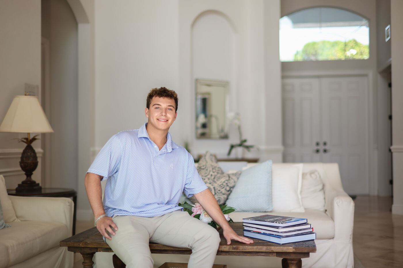 Jason seated in a living room
